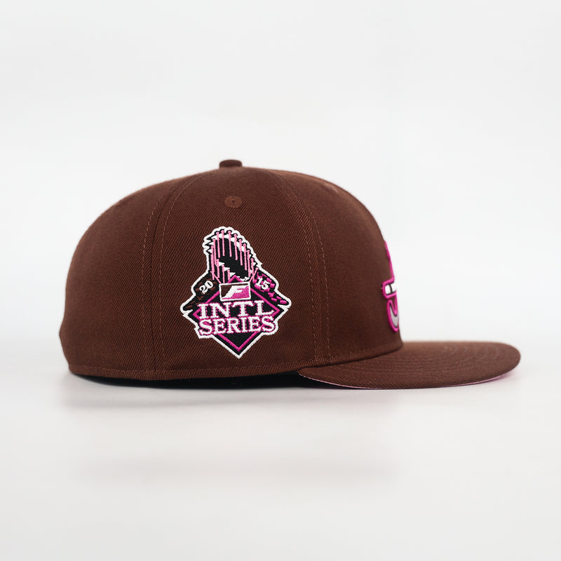 The Native chocolate and pink fitted cap, side profile